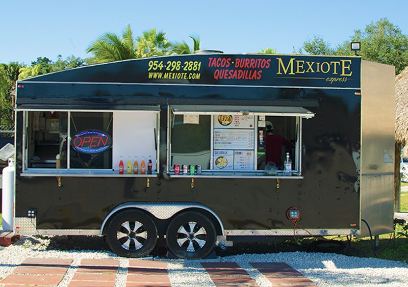 The Mexiote Express food truck parked under the palm trees